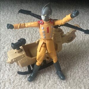 Yellow and Black Action Figure with Playset